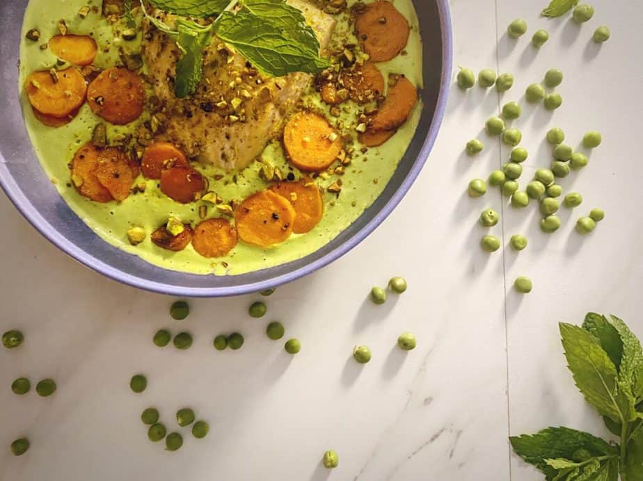 One more overhead shot of my beautiful salmon dinner in a blue bowl on a carrera background with peas and mint