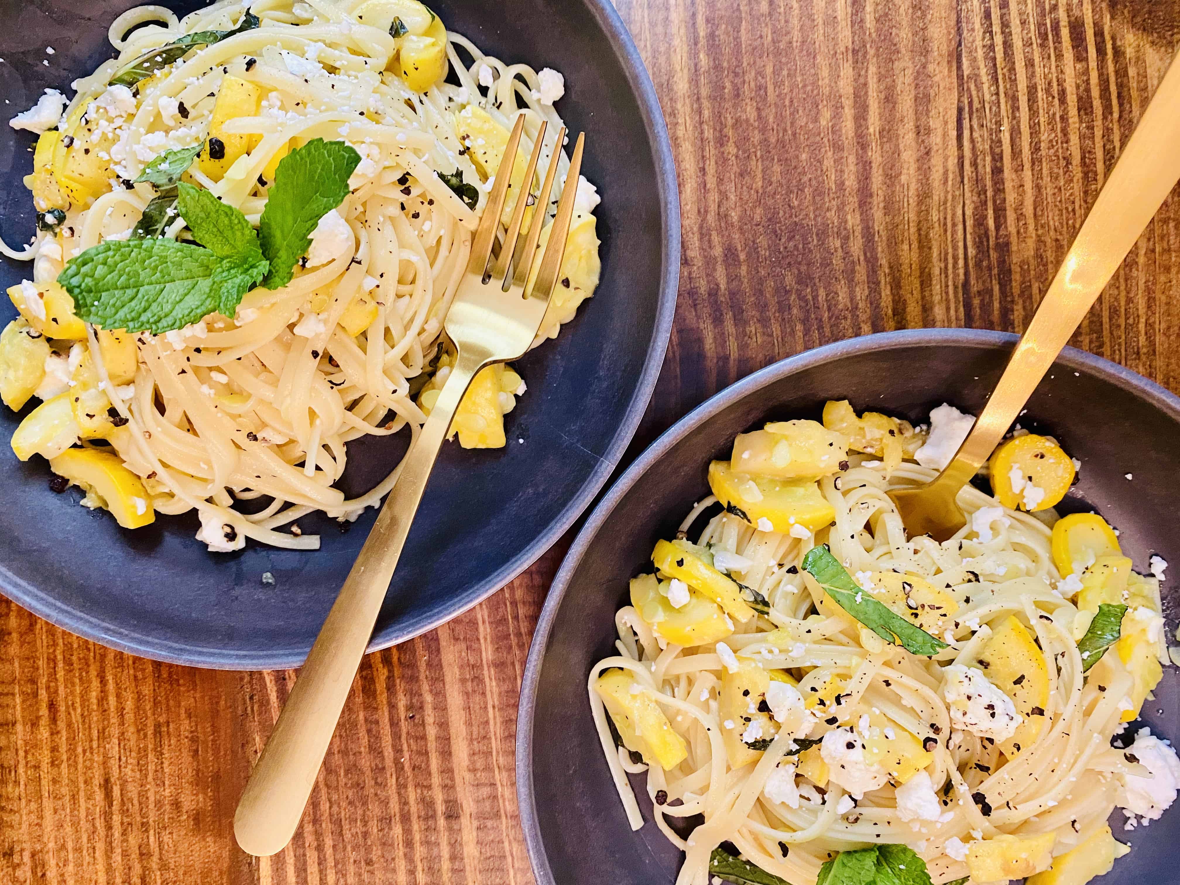 Two beautiful bowls of this 5 ingredient summer pasta waiting on our dinner table.