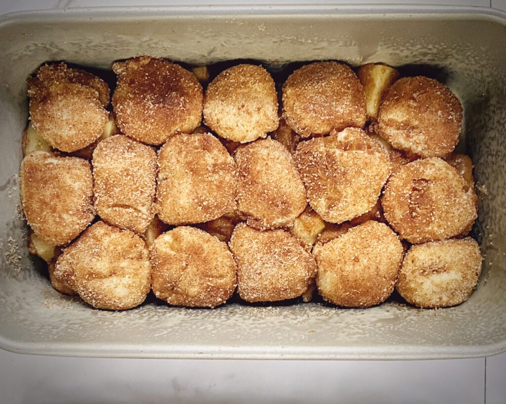 third layer of apple cinnamon monkey bread - cinnamon sugar dipped dough balls