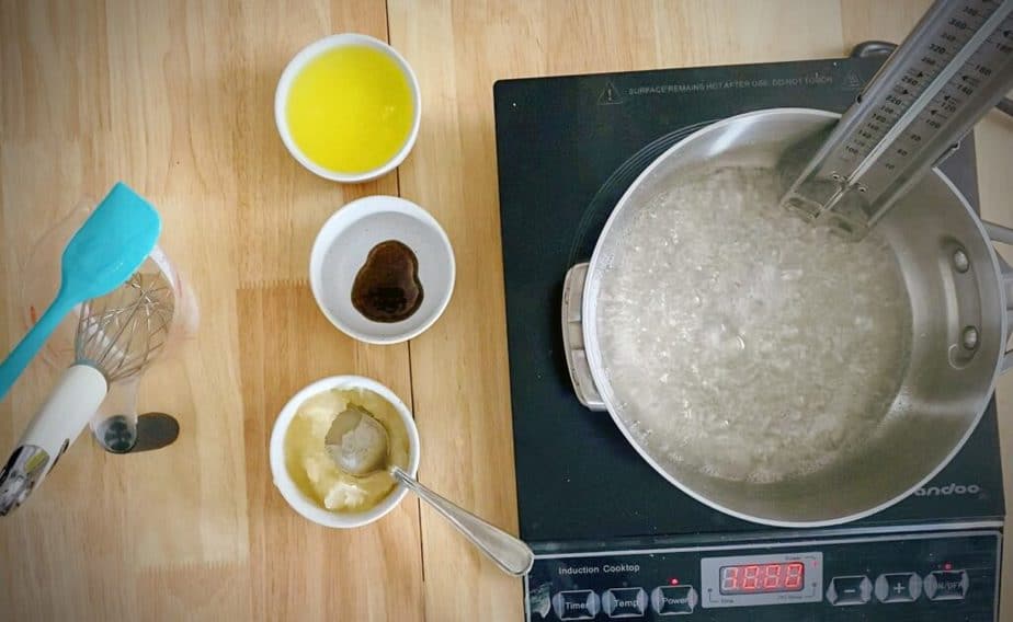 sugar, water and cornstarch in a saucepan with a candy thermometer at a boil