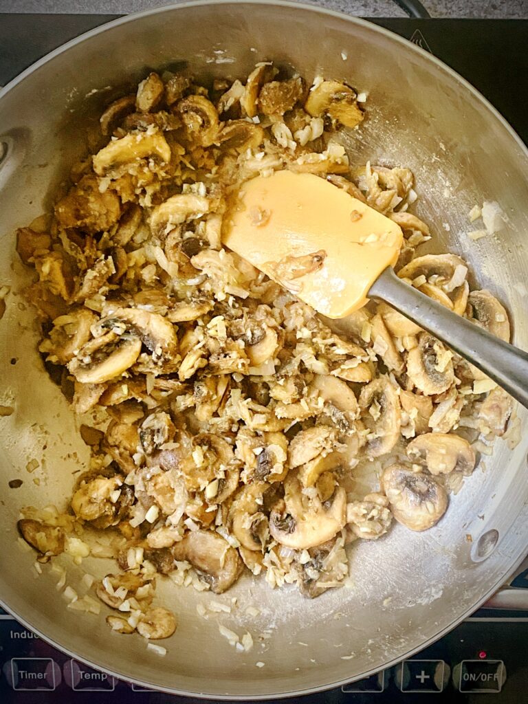sautéed mushrooms, garlic, onions and thyme after having flour added and cooked to a light brown