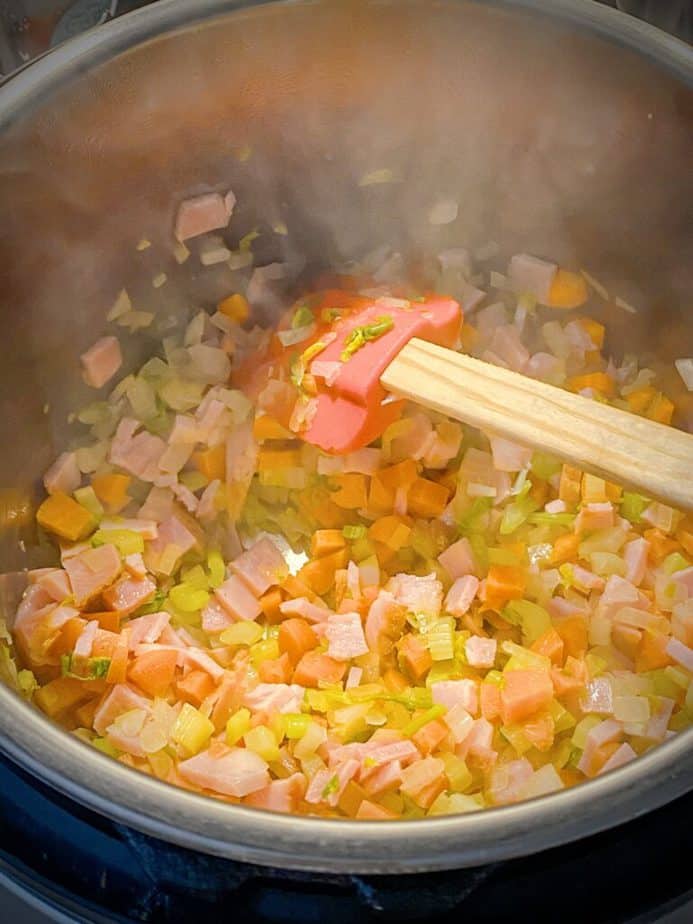 ham and mirepoix cooking together in instant pot