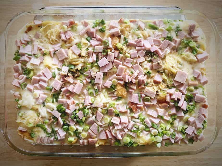 overhead shot of ham and swiss breakfast casserole after first (covered) bake