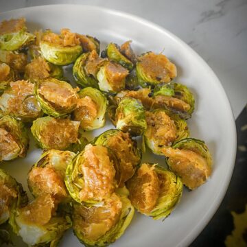 roasted brussels sprouts halves topped with trader joe's bacon jam.
