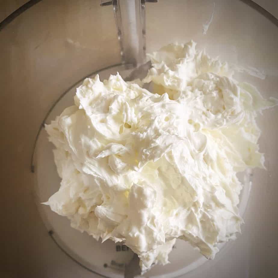 ingredients for whipped feta in the base of a food processor