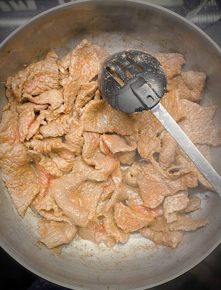 thinly sliced beef that has been cooked in sauté pan