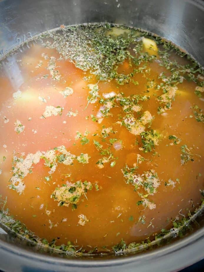 instant pot vegetable soup after being stirred together prior to being pressure cooked