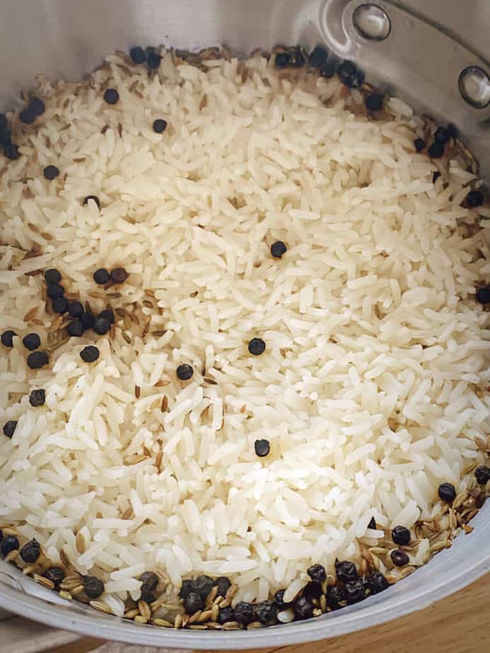 cumin rice in saucepan prior to being fluffed