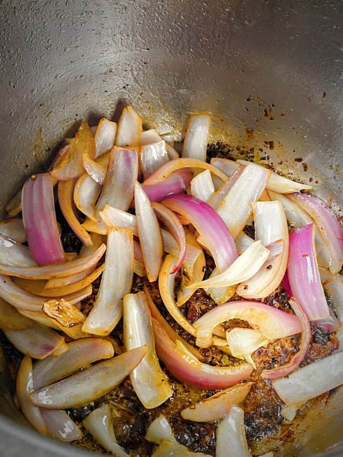 onion slices after first stir when cooking