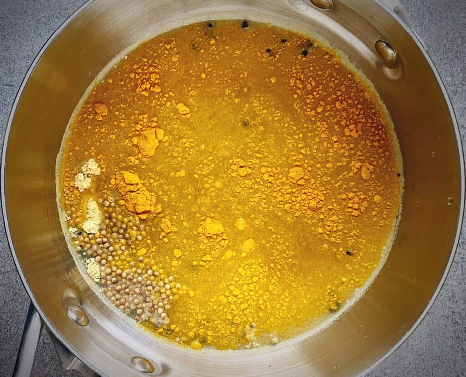 turmeric pickling brine ingredients in a saucepan
