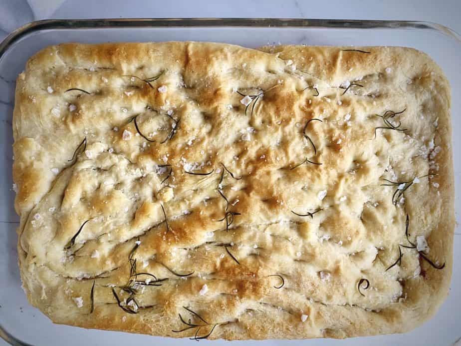 overhead shot of 9x13 with rosemary focaccia after baking