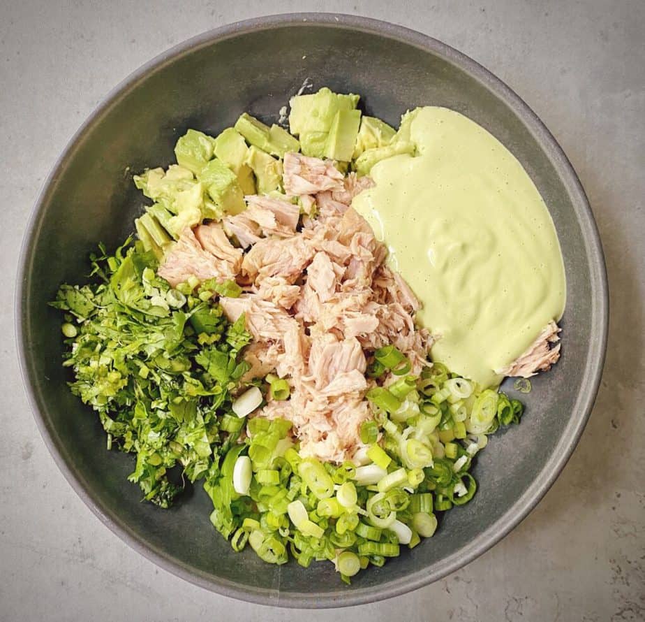 drained tuna, peruvian green sauce, cilantro, and remaining ingredients added to the bowl with the mashed avocado. 