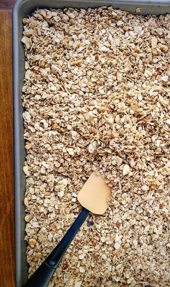mixing granola after second bake