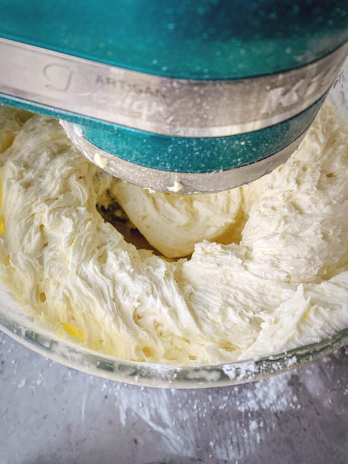 mixing buttercream in stand mixer.