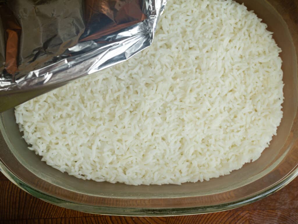 covering rice with foil.