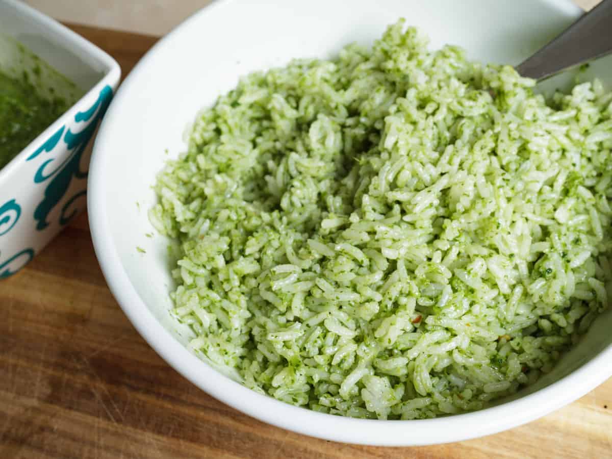 close up of zhoug green rice.