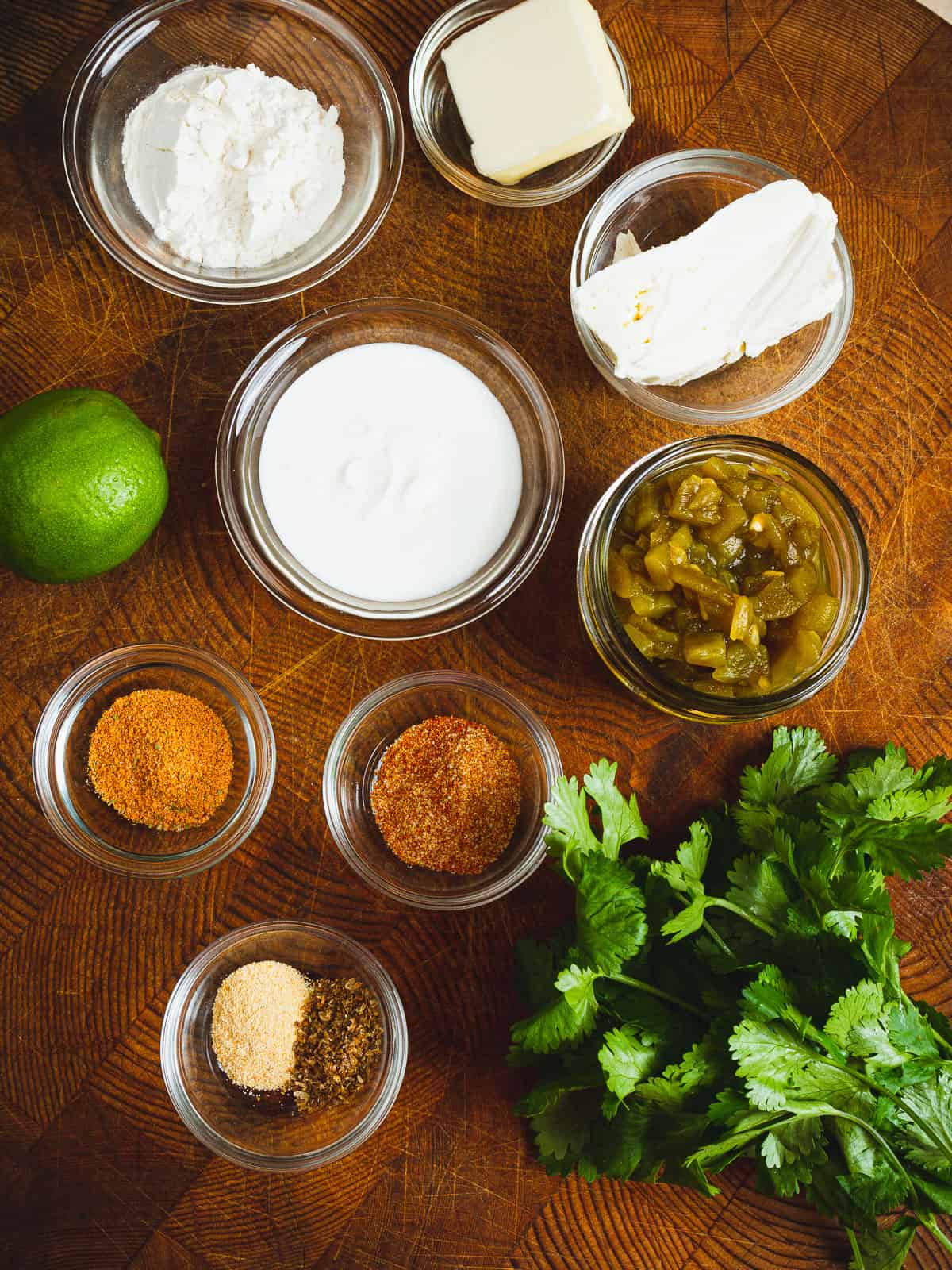 overhead shot of ingredients for making white queso sauce for fish burritos.