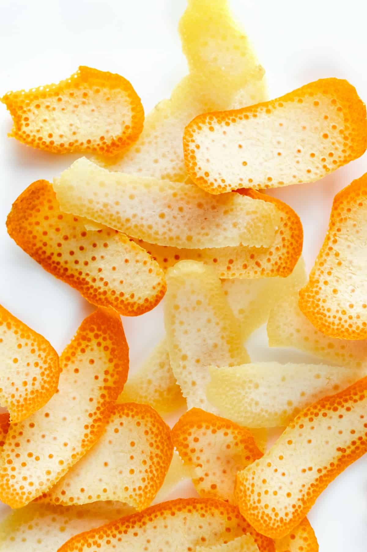 orange and lemon peels on a white surface. photo credit okeykat.