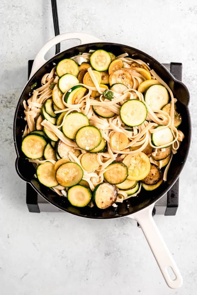 linguine pasta tossed with cooked summer squash and zucchini.