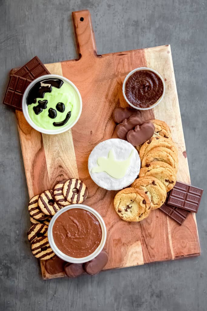 dips and first pieces of candy and cookies added to the s'mores charcuterie board as anchors.