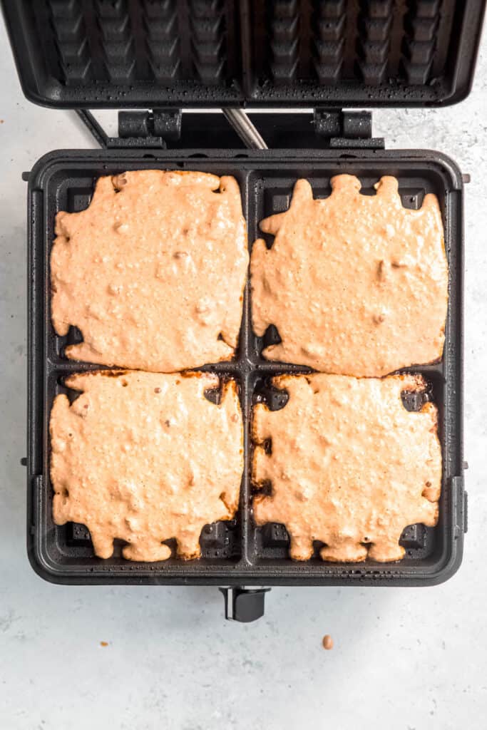 process shot - batter added to preheated waffle iron.