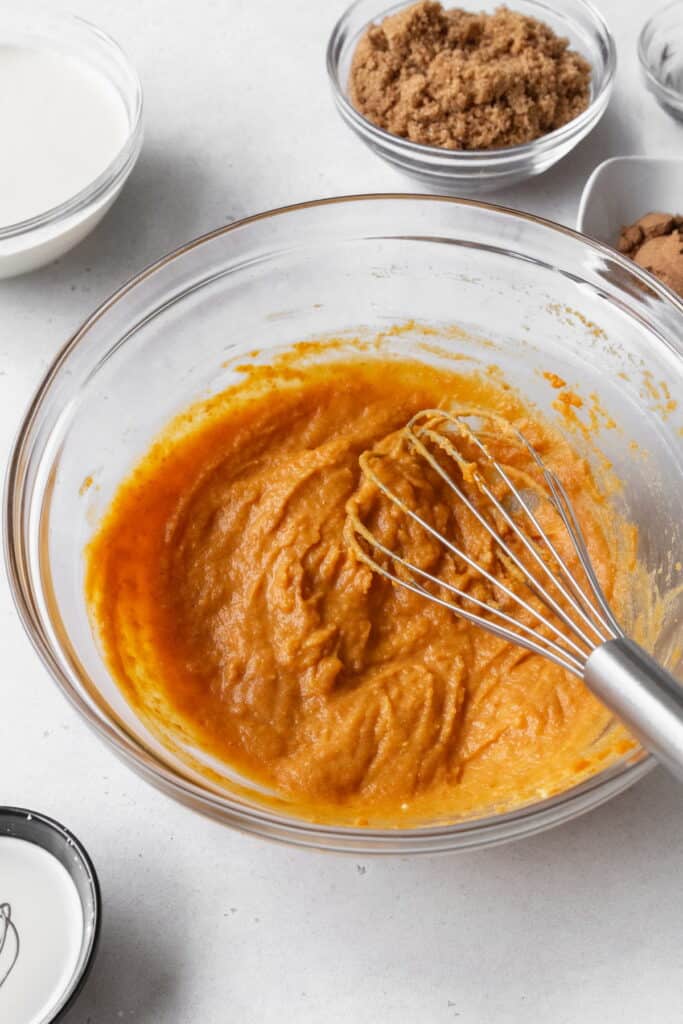 pumpkin purée addded to the bowl with the cream cheese mixture.