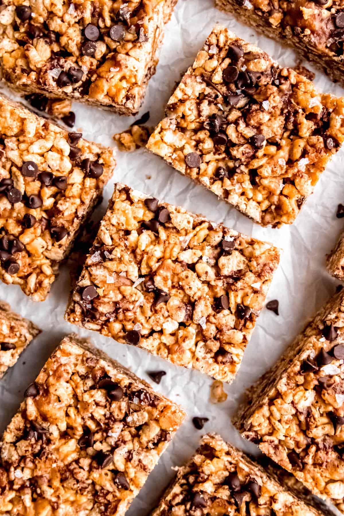 flat lay shot of peanut butter chocolate rice krispies treats cut into squares.