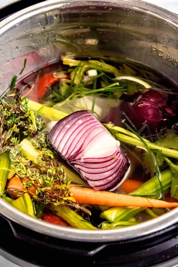 instant pot vegetable scrap broth before pressure cooking.