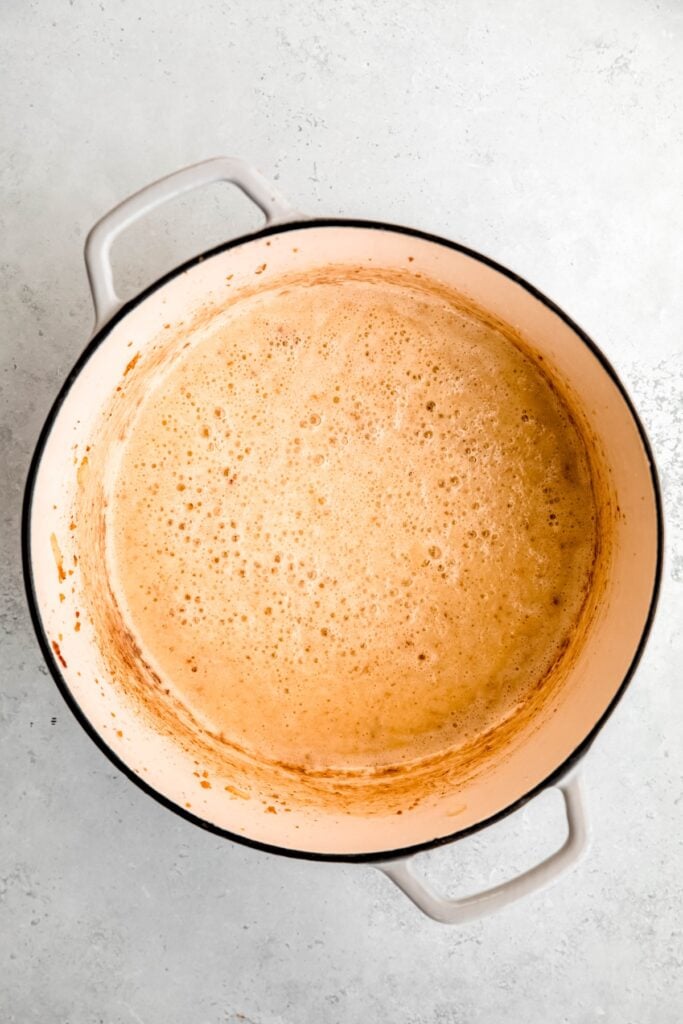 butter and flour bubbling in the Dutch oven to make a roux.