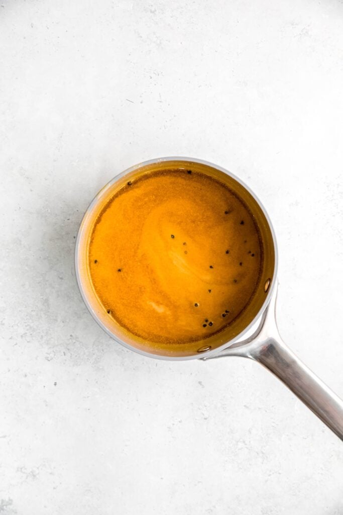 turmeric brine after heating and dissolving the salt and mustard.