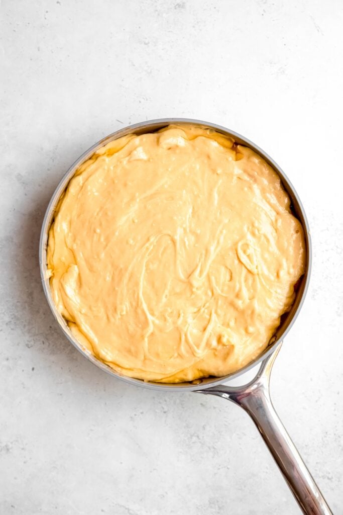 cake batter smoothed over the almond banana and caramel layer.