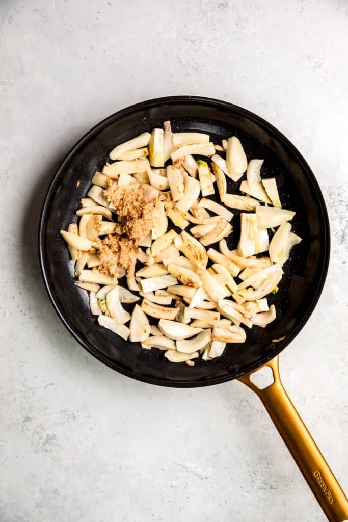 garlic added to the pan with the sweated fennel.