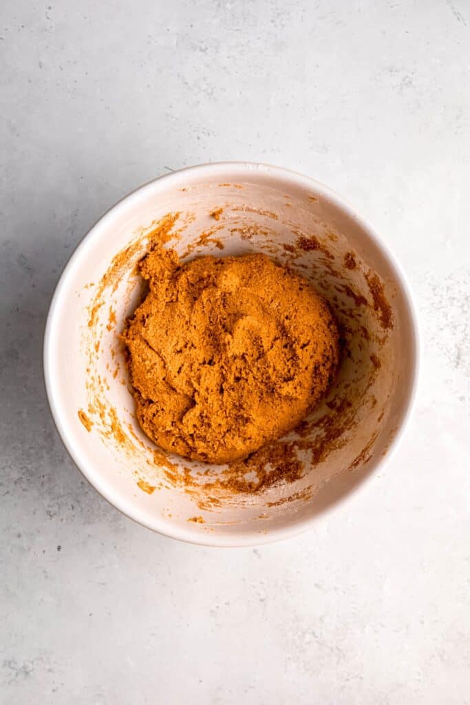 dog treat dough after mixing in the dry ingredients; it's very thick and dry looking.