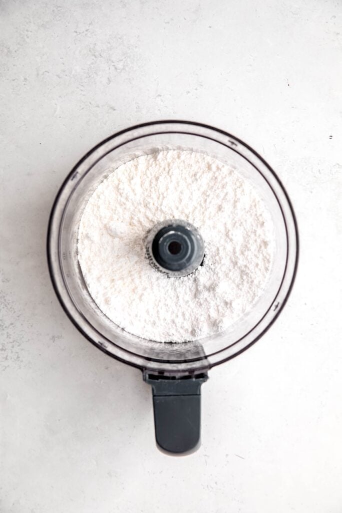 powdered milk and powdered sugar mixture in a food processor.