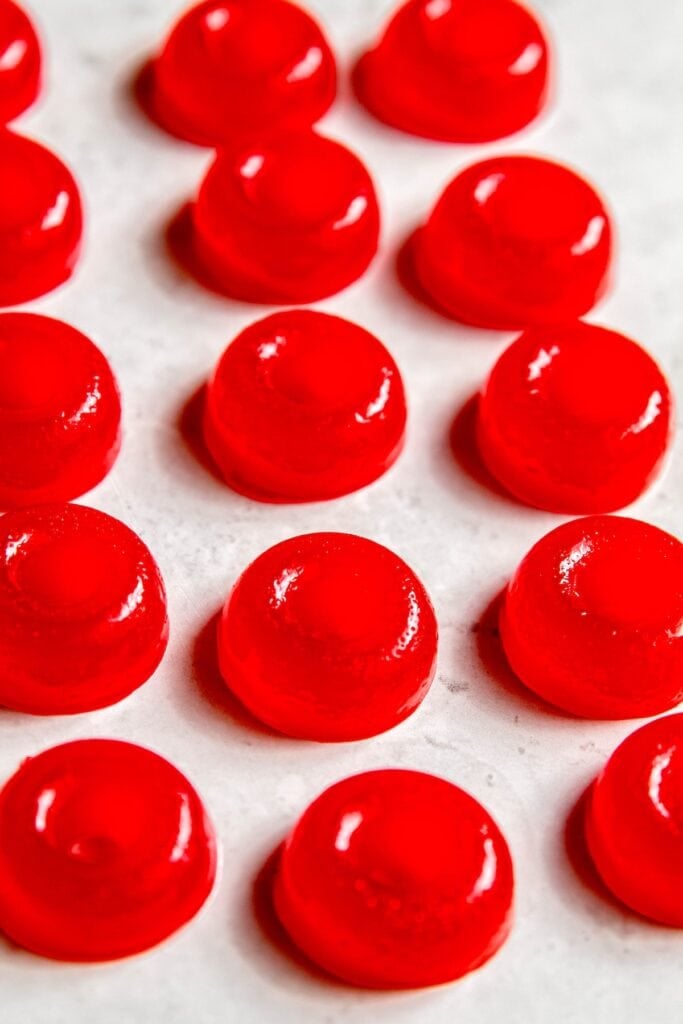 weed gummies after being allowed to set in the molds and turning out onto a white table.
