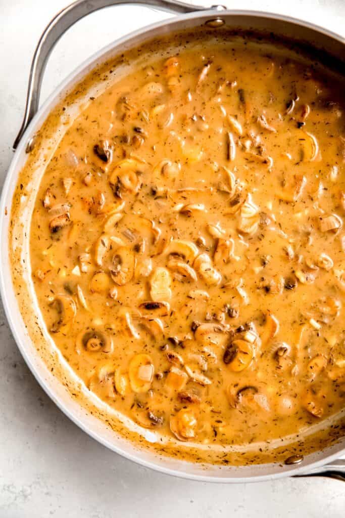 left ¾ of a skillet with easy mushroom gravy after simmering until thick and glossy.