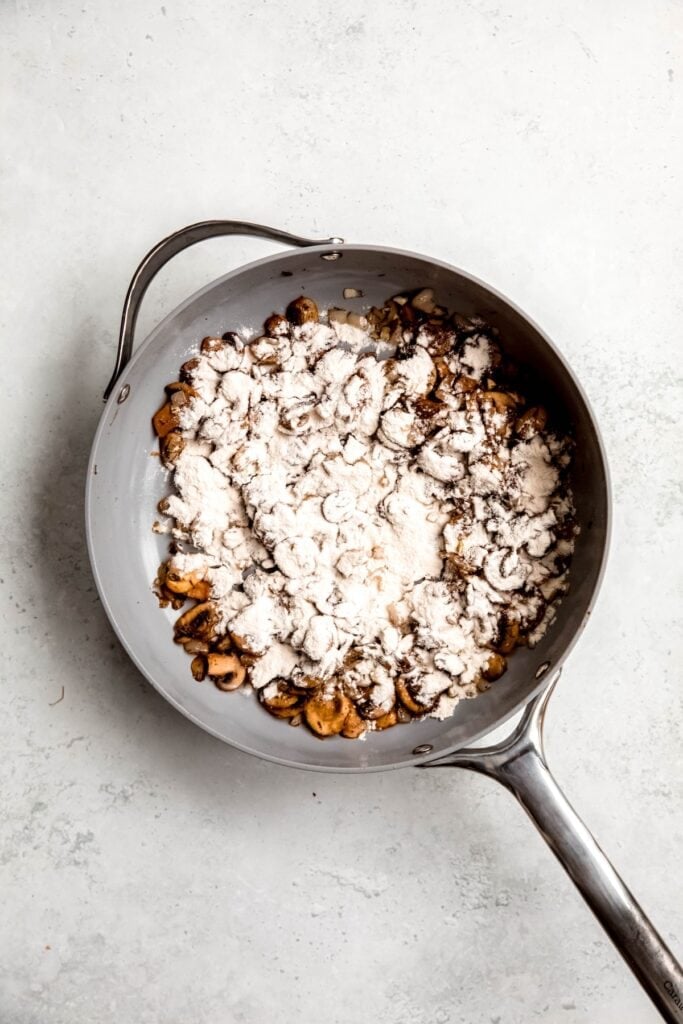flour added to the skillet with the mushroom mixture.