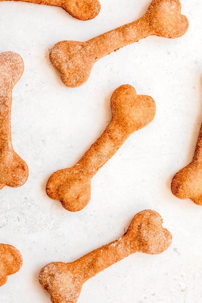 overhead shot of bone shaped homemade banana and peanut butter dog treats.