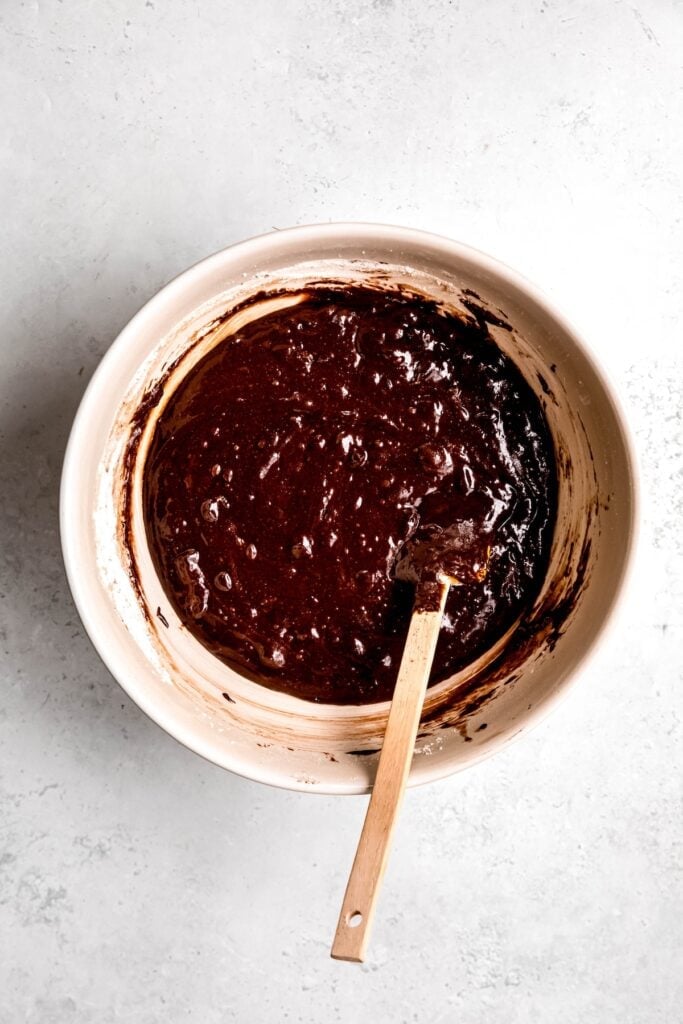 dark chocolate brownie batter after folding in the dark chocolate chunks and dry ingredients.