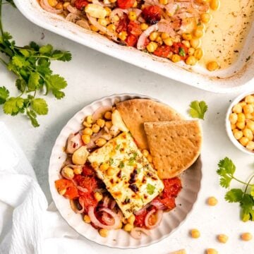 square hero image of Mediterranean baked feta with tomatoes and chickpeas.