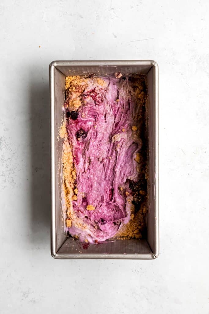 blueberry sauce and graham cracker crumbles layered atop the blueberry ice cream.