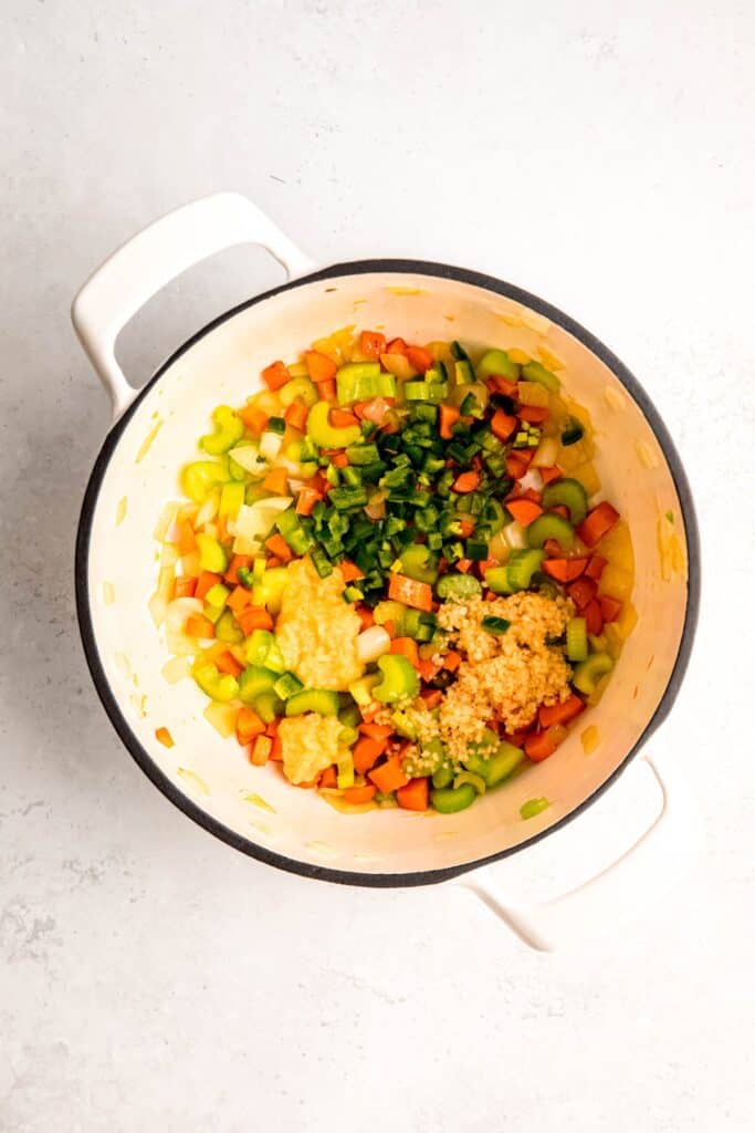 garlic, ginger, and jalapeños added to the sautéed mirepoix.