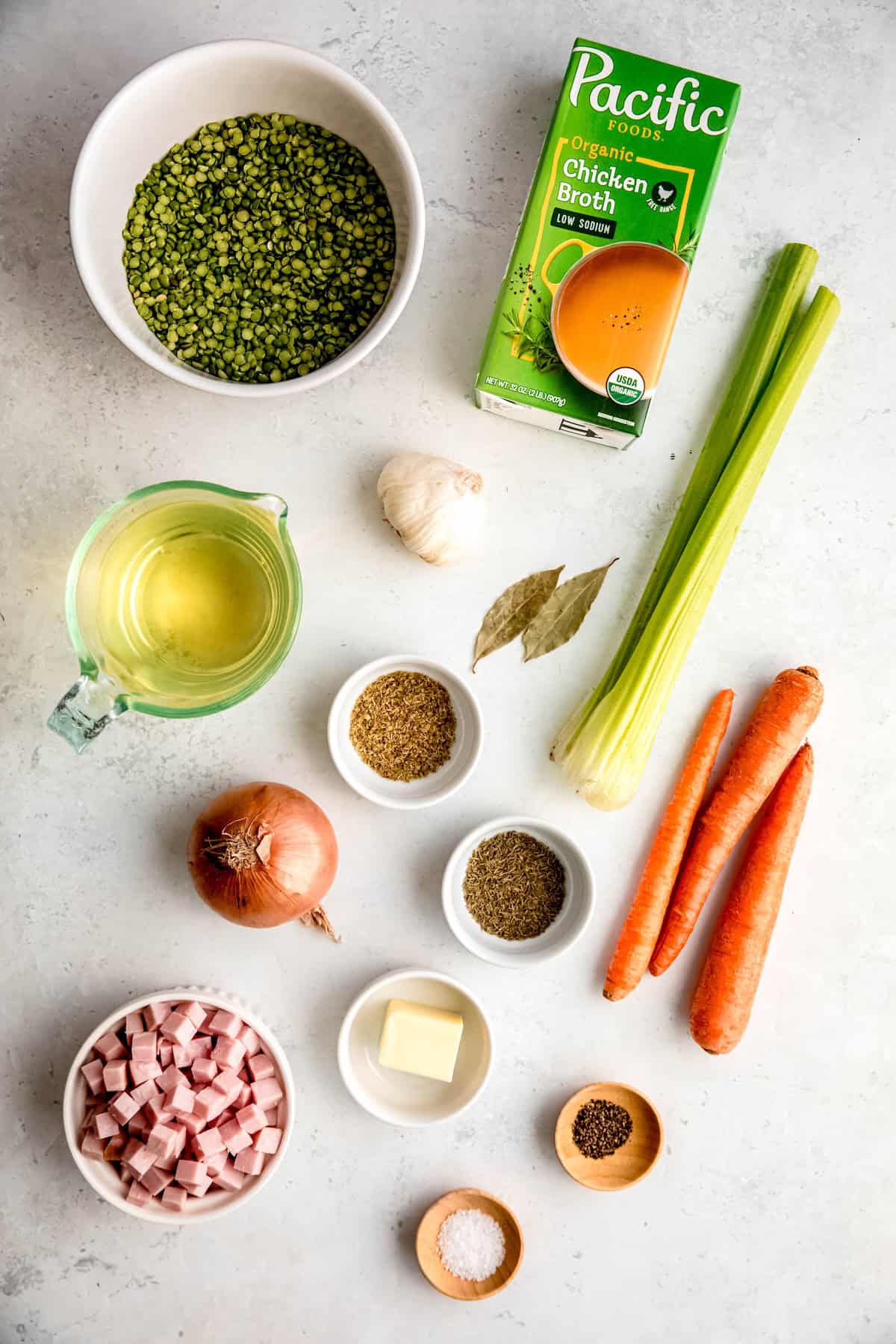 instant pot split pea and ham soup recipe ingredients measured out on a white table.